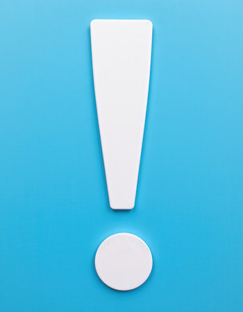 White exclamation mark on a blue background. 3d illustration.の素材