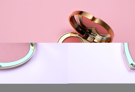 Gold wedding rings on a pink background. 3d rendering. Copy space.の素材