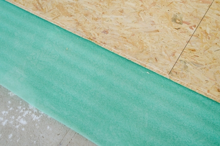 Installation of insulation and chipboard floorの写真素材