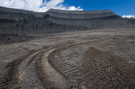 Layers of rough coal in the open pit mineの写真素材