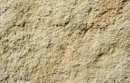 Surface of rough yellow sandstoneの写真素材