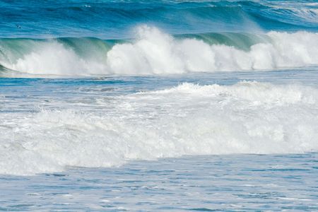 Pacific Ocean waves and surf in early morning.