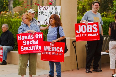 LOS ANGELES, CA-JUNE 24:  Protesters gather outside headquarters of The Western Justice Center Foundation on June 26, 2010.  Rally was organized to protest against Social Security and Medicare budget cuts.のeditorial素材