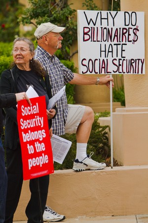 LOS ANGELES, CA-JUNE 24:  Protesters gather outside headquarters of The Western Justice Center Foundation on June 26, 2010.  Rally was organized to protest against Social Security and Medicare budget cuts.のeditorial素材