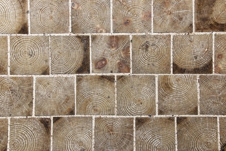 Paving blocks made of wood with natural patterns background.の写真素材