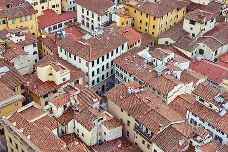 Red roofs of old houses Florence seen from the observation platform of Campanile di Giotto. Florence is the ancient capital city of the Italian region of Tuscany, Metropolitan City of Florence.の写真素材