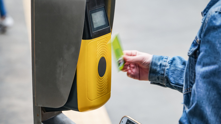 Passengers validating tickets, rush to the train, public transport. Trains at the railway station of San Bento 1864 in Portoの写真素材