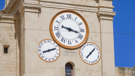 Ancient clock in the ancient city of Valletta, Malta