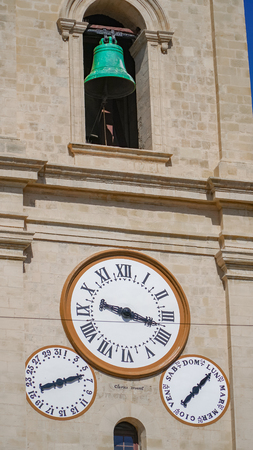 Ancient clock in the ancient city of Valletta, Maltaの写真素材