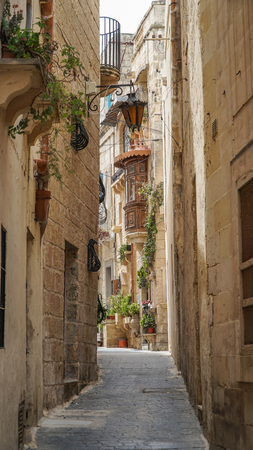 Walking along the medieval streets of old Mdina, Maltaの写真素材
