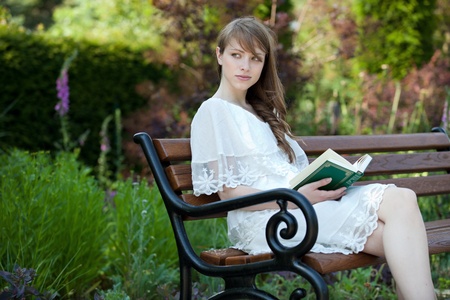A young, beautiful lady enjoys the afternoon の写真素材