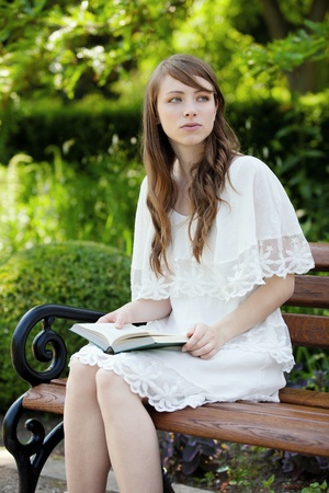 A young, beautiful lady enjoys the afternoon の写真素材