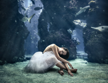 Pretty ballerina is under the waterの写真素材