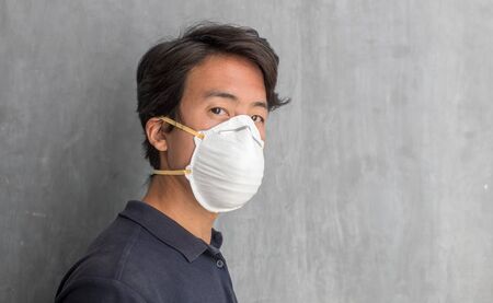 Chinese man wearing a protection mask