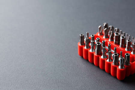Set of heads for screwdriver. Tools collection.  close up, Bits on black background
