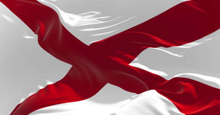 flag of Alabama waving in the wind. Patriotic concept about state. 3d illustrationの写真素材