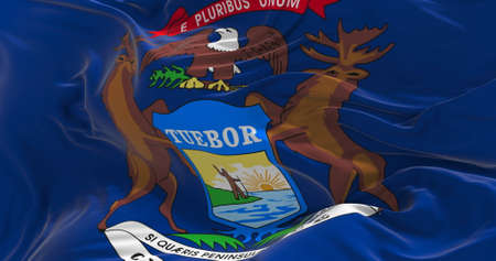 flag of Michigan waving in the wind. Patriotic concept about state. 3d illustration.の写真素材