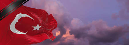 national flag of Turkish with Mourning Ribbon. memory of victims of war, terrorist attack. Black funeral ribbon on flag Honoring memory of victims. 3D illustration.の写真素材