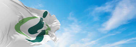 official city flag of Saitama, Saitama waving in the wind on flagpoles against sky with clouds on sunny day. Japan Patriotic concept. 3d illustration.の写真素材