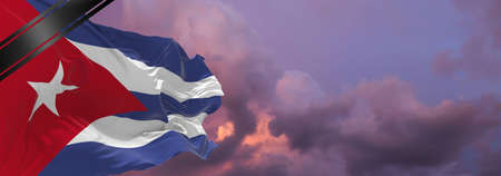 national flag of Cuba with Mourning Ribbon. memory of victims of war, terrorist attack, coronavirus. Black funeral ribbon on flag Honoring memory of victims. 3D illustration.の写真素材