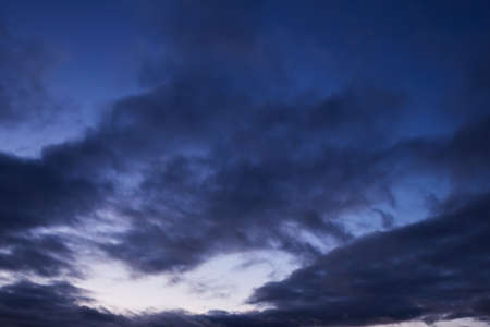 Panorama of Calm evening sky with clouds. Sky background after sunset. Sunrise sky with lighted...