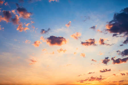 Panorama of evening sky with clouds. sunset Sky background, Sunrise sky with lighted clouds. Beauty evening sunrise over seaの写真素材