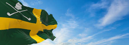 flag of Wreay village  at cloudy sky background on sunset. panoramic view. united kingdom of great Britain, England. copy space for wide banner. 3d illustrationの写真素材