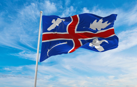 flag of Wroxton village  at cloudy sky background on sunset. panoramic view. united kingdom of great Britain, England. copy space for wide banner. 3d illustrationの写真素材