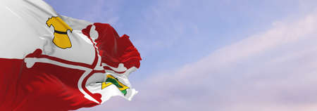 flag of county Howard, Maryland , USA at cloudy sky background on sunset, panoramic view, Patriotic concept about Howard, Maryland and copy space for wide banner. 3d illustrationの写真素材