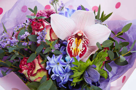 a wedding bouquet  isolated on white. Fresh, lush bouquet of colorful flowersの写真素材