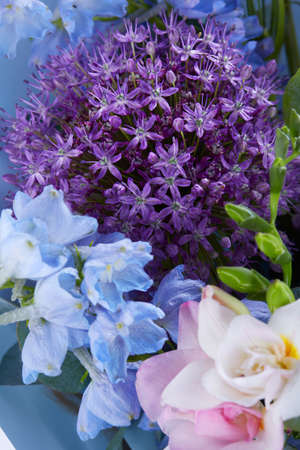 a wedding bouquet isolated on white. Fresh, lush bouquet of colorful flowers. Close up