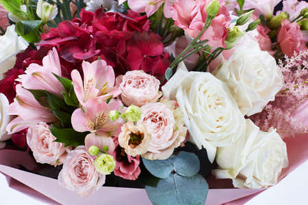 a wedding bouquet  isolated on white. Fresh, lush bouquet of colorful flowers. Close upの写真素材