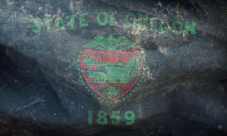 Top view of retro flag of African Americans of Oregon state, untied states of America with grunge texture. USA Juneteenth Freedom Day. no flagpole. Plane design layout. Flag backgroundの写真素材