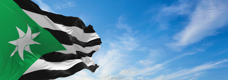 flag of Nenthead village  at cloudy sky background on sunset. panoramic view. united kingdom of great Britain, England. copy space for wide banner. 3d illustrationの写真素材