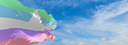 flag of Altersex pride waving in the wind at cloudy sky. Freedom and love concept. Pride month. activism, community and freedom Concept. Copy space. 3d illustrationの写真素材