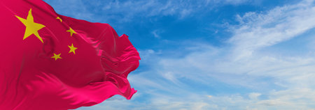 flag of Bisexual Pride, People's Republic of China waving in the wind at cloudy sky. Freedom and love concept. Pride month. activism, community and freedom Concept. Copy space. 3d illustrationの写真素材