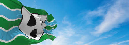 flag of county Worcestershire, UK at cloudy sky background on sunset, panoramic view. County of united kingdom of great Britain, England. copy space for wide banner, 3d illustrationの写真素材