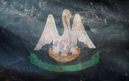 Top view of retro flag of African Americans of Louisiana state, untied states of America with grunge...