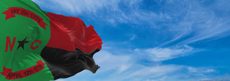 flag of African Americans of North Carolina state, untied states of America at cloudy sky background on sunset, panoramic view. copy space for wide banner. 3d illustrationの写真素材
