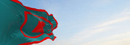 official flag of Dervish at cloudy sky background on sunset, panoramic view. patriot and travel concept. copy space for wide banner. 3d illustrationの写真素材