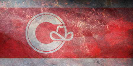 Top view of retro flag of Calgary, Alberta, Canada with grunge texture. Canadian patriot and travel...