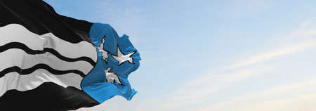 flag of Canton of Aargau , Switzerland at cloudy sky background on sunset, panoramic view. Swiss...