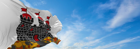 flag of Edinburgh  at cloudy sky background on sunset. panoramic view. united kingdom of great Britain, England. copy space for wide banner. 3d illustrationの写真素材