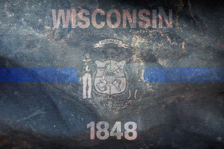 Top view of blue line flag of Wisconsin state, Usa. United states of America police flag. retro flag with grunge texture. no flagpole. Plane layout, design. Flag backgroundの写真素材