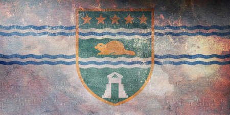 Top view of retro flag of Surrey British Columbia, Canada with grunge texture. Canadian patriot and travel concept. no flagpole. Plane design, layout. Flag backgroundの写真素材