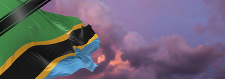national flag of Tanzania with Mourning Ribbon. memory of victims of war, terrorist attack,...