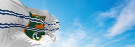 flag of Surrey British Columbia , Canada at cloudy sky background on sunset, panoramic view. Canadian travel and patriot concept. copy space for wide banner. 3d illustrationの写真素材