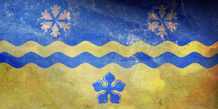 Top view of retro flag of Prince George, British Columbia, Canada with grunge texture. Canadian patriot and travel concept. no flagpole. Plane design, layout. Flag backgroundの写真素材