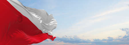 flag of Utrecht city , Netherlands at cloudy sky background on sunset, panoramic view. Dutch travel and patriot concept. copy space for wide banner. 3d illustrationの写真素材