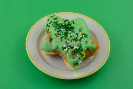 Shamrock-shaped Holiday donut with green frosting for Saint Patrick's Dayの写真素材